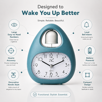 Single bell analog alarm clock with large easy-to-read numbers, quartz accuracy, loud bell alarm, battery-powered operation, compact Nordic-inspired design in teal blue.