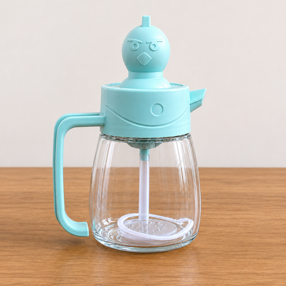 Multi-Use Glass Oil Dispenser with Brush Head and clear glass bottle, ergonomic handle, detachable silicone brush, and easy-pour spout for cooking, grilling, and baking.
