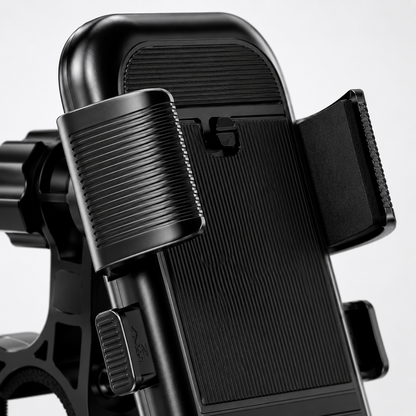 Macro view of the semi-automatic side clamps with textured grip and silicone padding, designed to securely hold smartphones during motorcycle and bicycle rides.