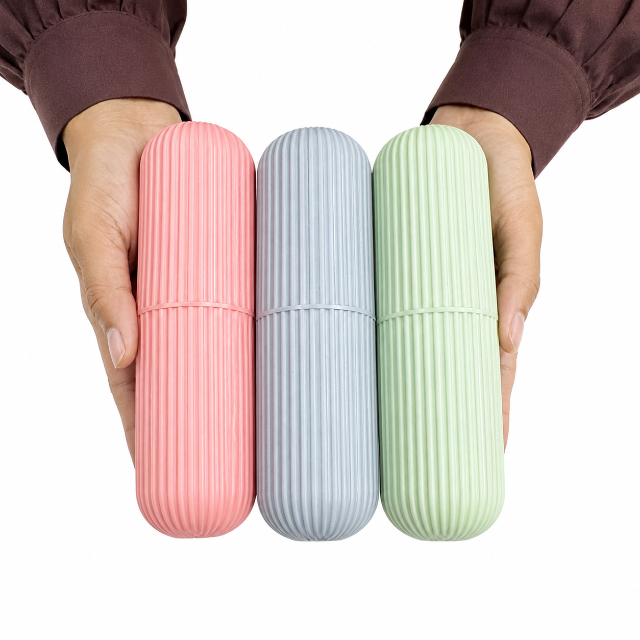 Pastel toothbrush travel cases in pink, blue and green colors, portable protective toothbrush holders for hygienic storage