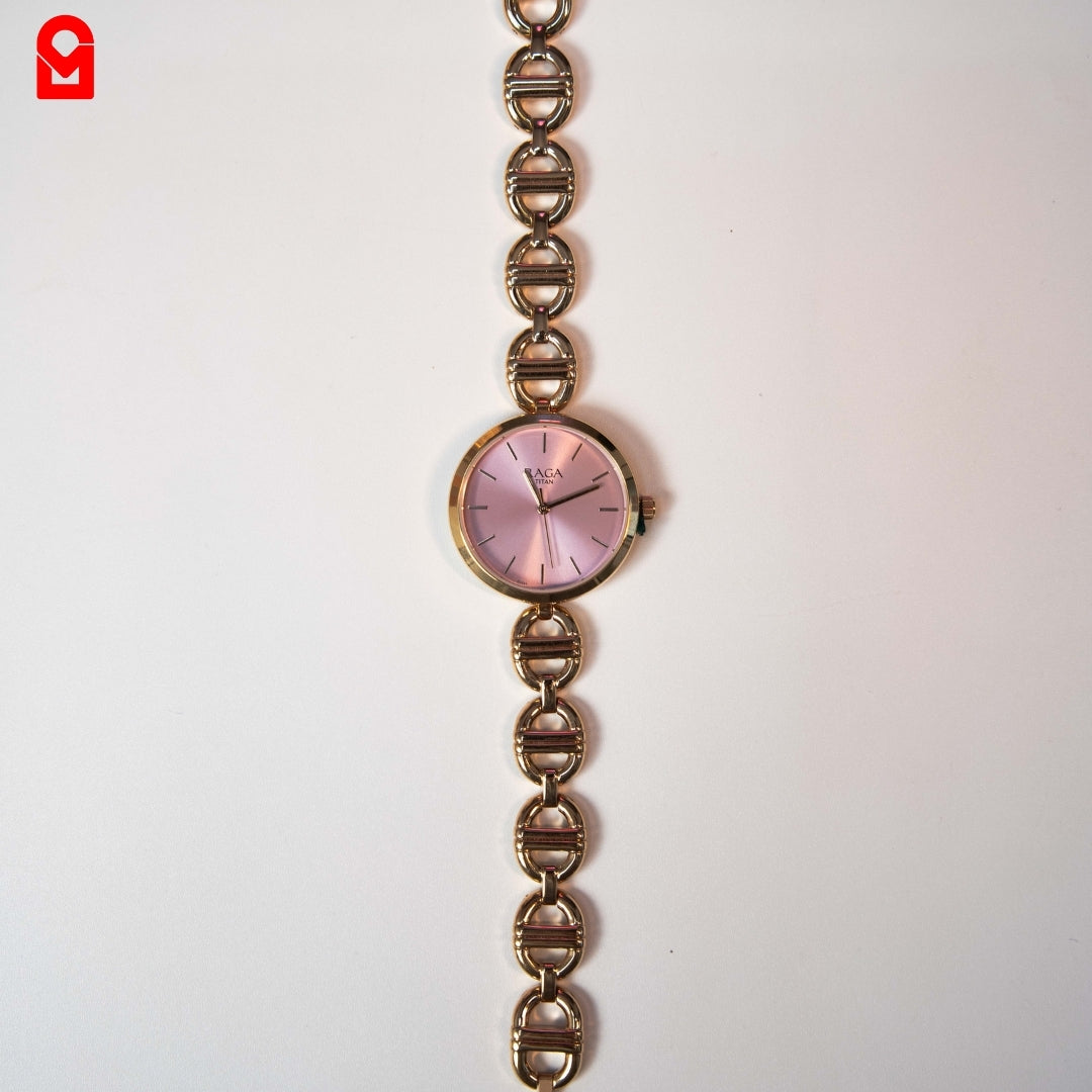 Women’s bracelet watch with pink dial and linked steel strap on white background.