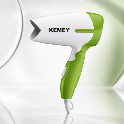 Portable foldable hair dryer with white and green finish, compact ergonomic design, 800W corded electric dryer with concentrator nozzle for home and travel use.