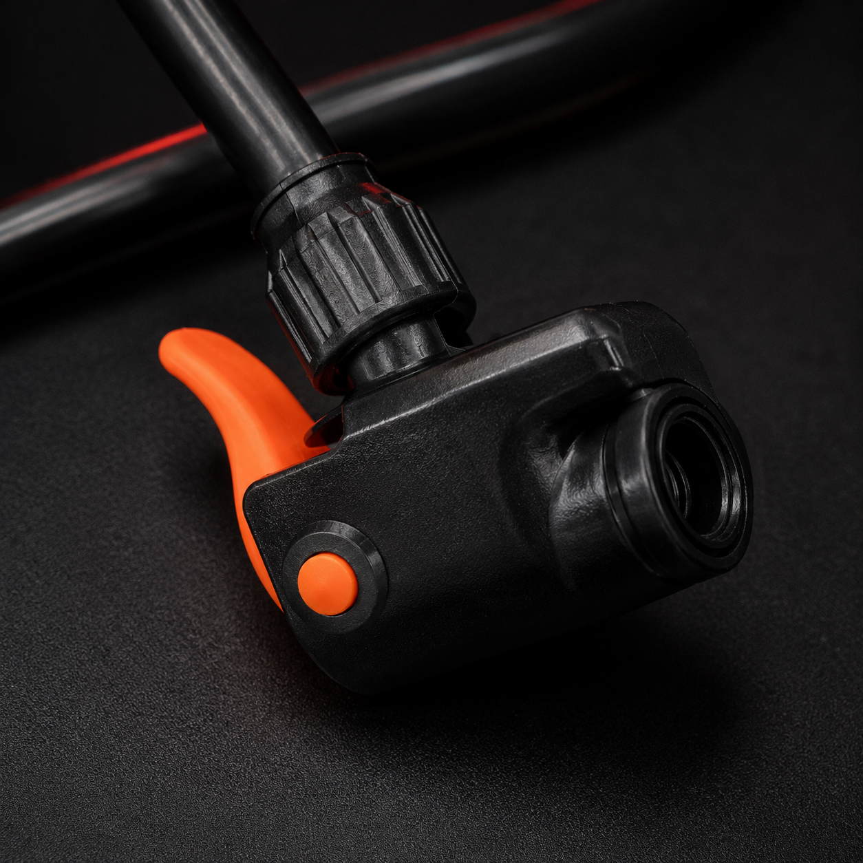 Close-Up of Portable Mini Foot Pump Secure Valve Lock Connector for Leak-Proof Bicycle Tire Inflation