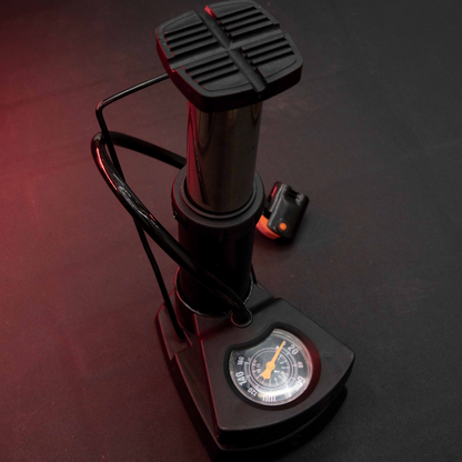 Angled View of Portable Mini Foot Pump with Accurate Pressure Gauge and Reinforced Steel Frame