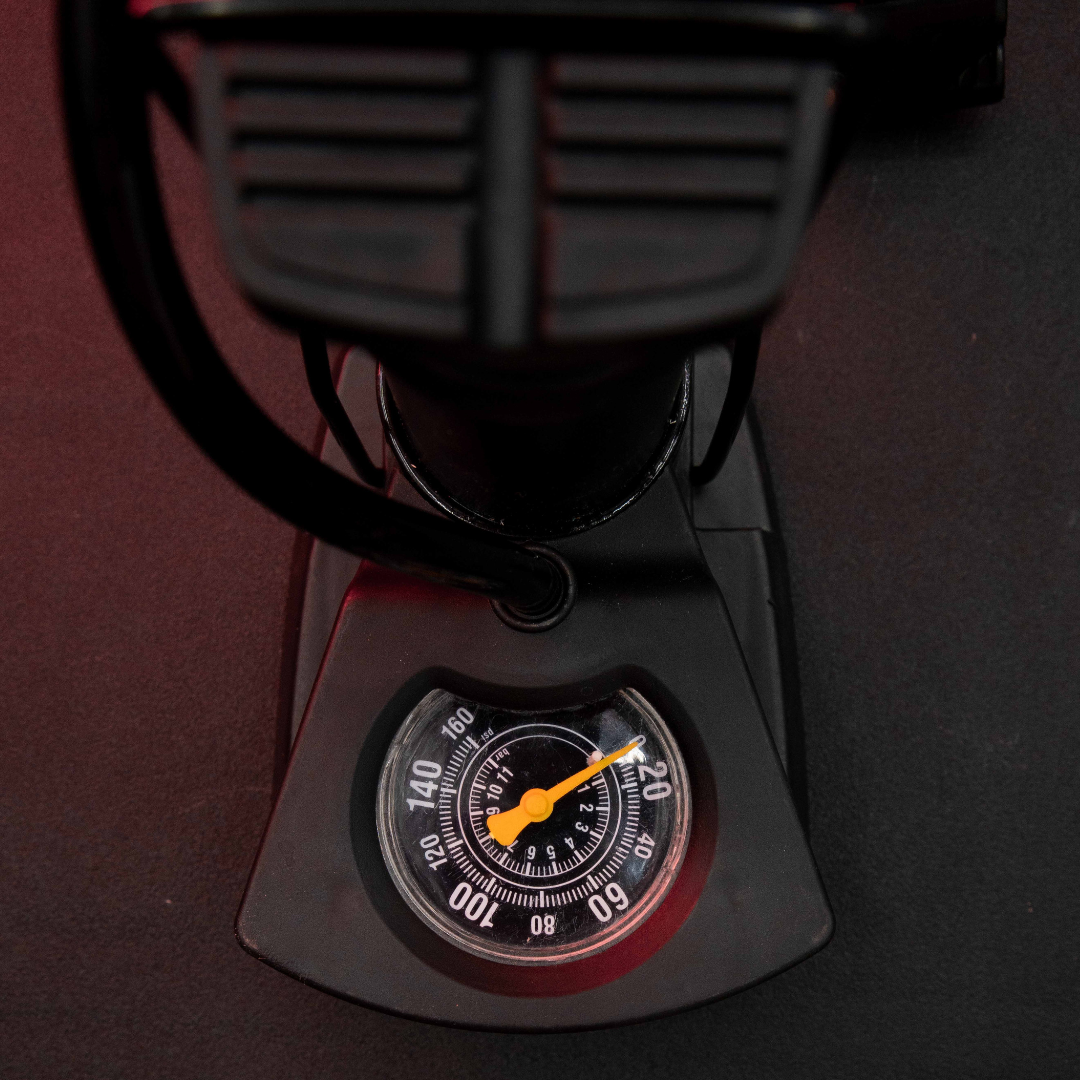 Close-Up of Portable Mini Foot Pump Pressure Gauge with Easy-to-Read Inflation Dial