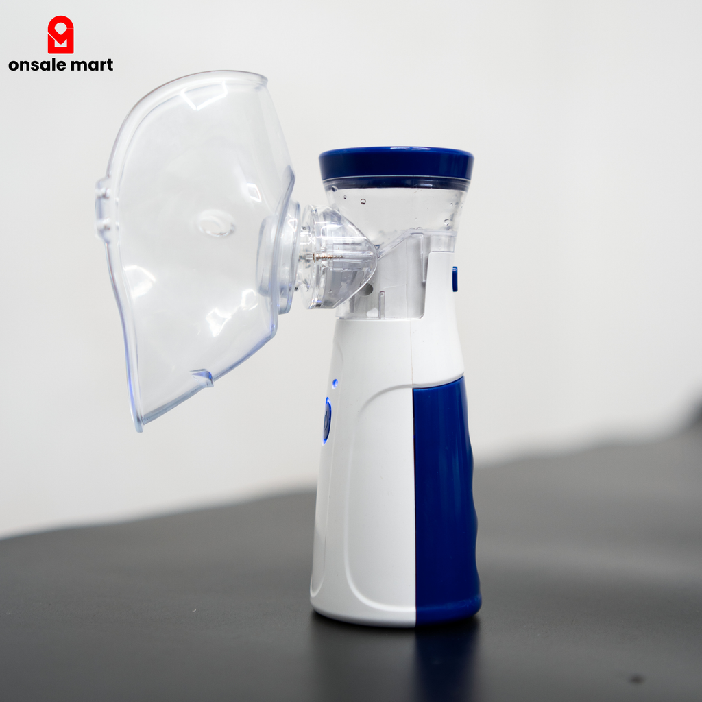 Portable nebulizer machine on white background.
