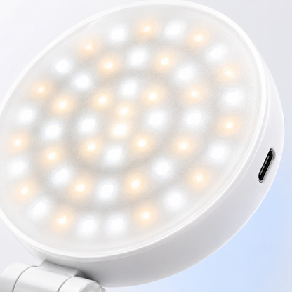 Close-up of the K-49 CCT mobile phone fill light featuring a high-density LED array with warm and cool LEDs behind a premium frosted diffuser.