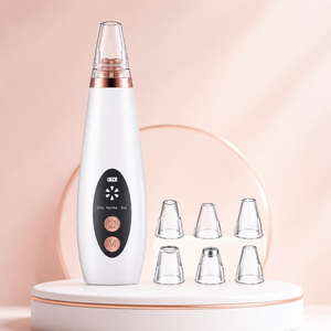 Premium rechargeable blackhead remover vacuum cleaner displayed with six suction head attachments on a clean skincare-themed background. White and rose-gold facial pore cleaner designed for blackhead removal and pore cleansing.