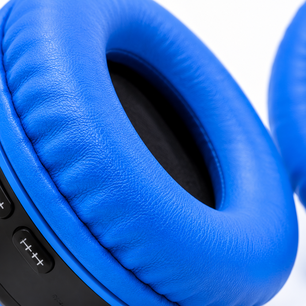Extreme close-up of the Wireless 771A headphone's premium blue memory-foam ear cushion, highlighting the soft leather-textured padding designed for long-lasting comfort and over-ear noise isolation.