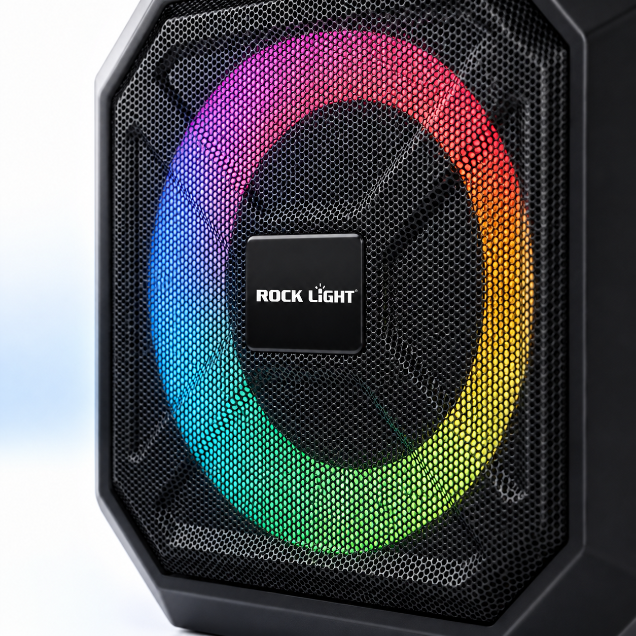 Close-up of a portable Bluetooth karaoke speaker featuring a premium black metal grille and vibrant RGB LED ring lighting for party entertainment.