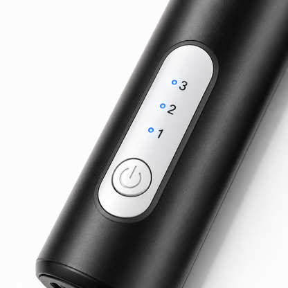 Macro view of a handheld milk frother featuring one-touch power button, three LED speed indicators and ergonomic matte black finish.