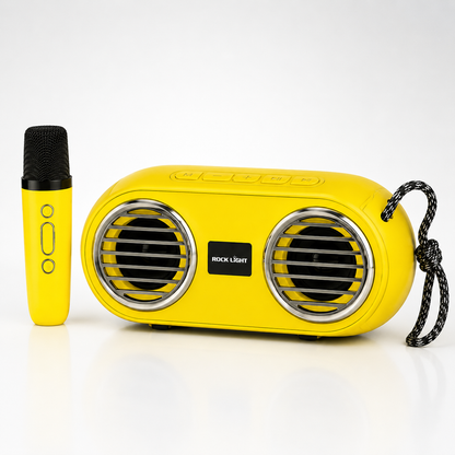 Yellow portable Bluetooth karaoke speaker with dual front speaker grilles, wireless microphone, carry rope, compact tabletop design and modern portable audio system for music and karaoke.