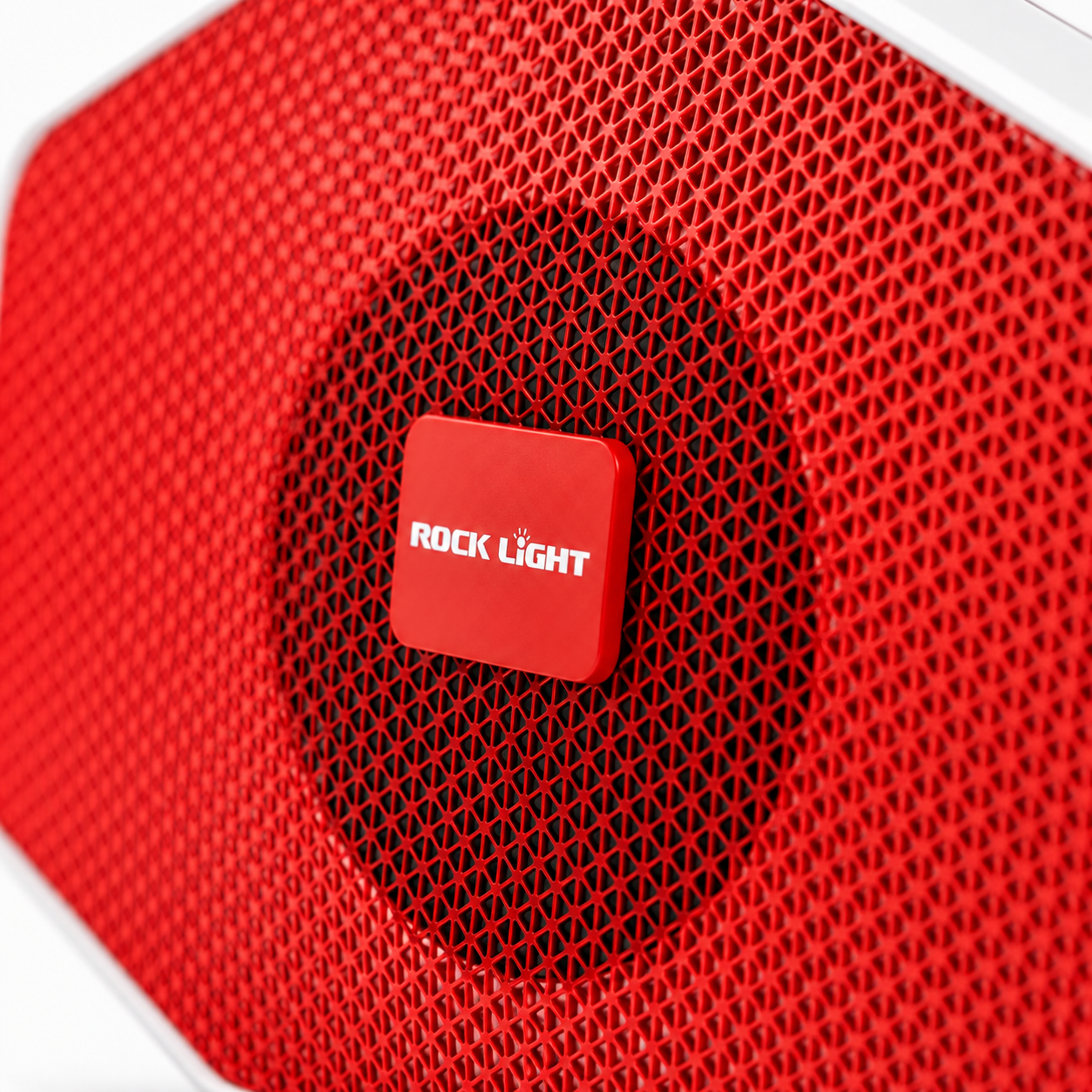 Close-up of a portable Bluetooth speaker with premium red metal grille, central 5W speaker driver and modern geometric mesh design.