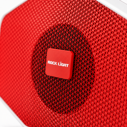 Close-up of a portable Bluetooth speaker with premium red metal grille, central 5W speaker driver and modern geometric mesh design.