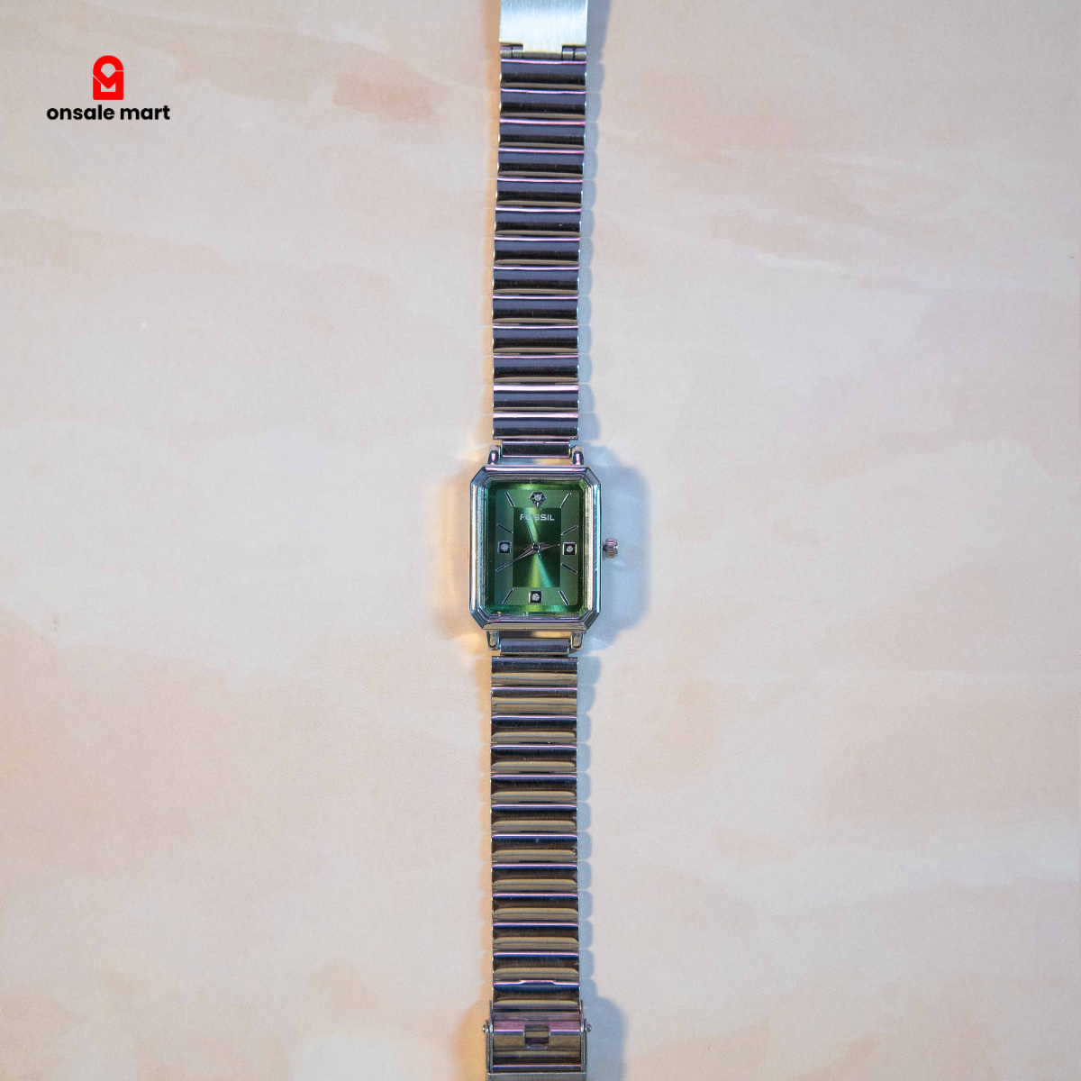 Rectangular analog watch featuring green dial and silver-tone steel chain strap.