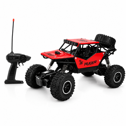 RC rock crawler with pistol-grip remote controller and oversized off-road tyres.