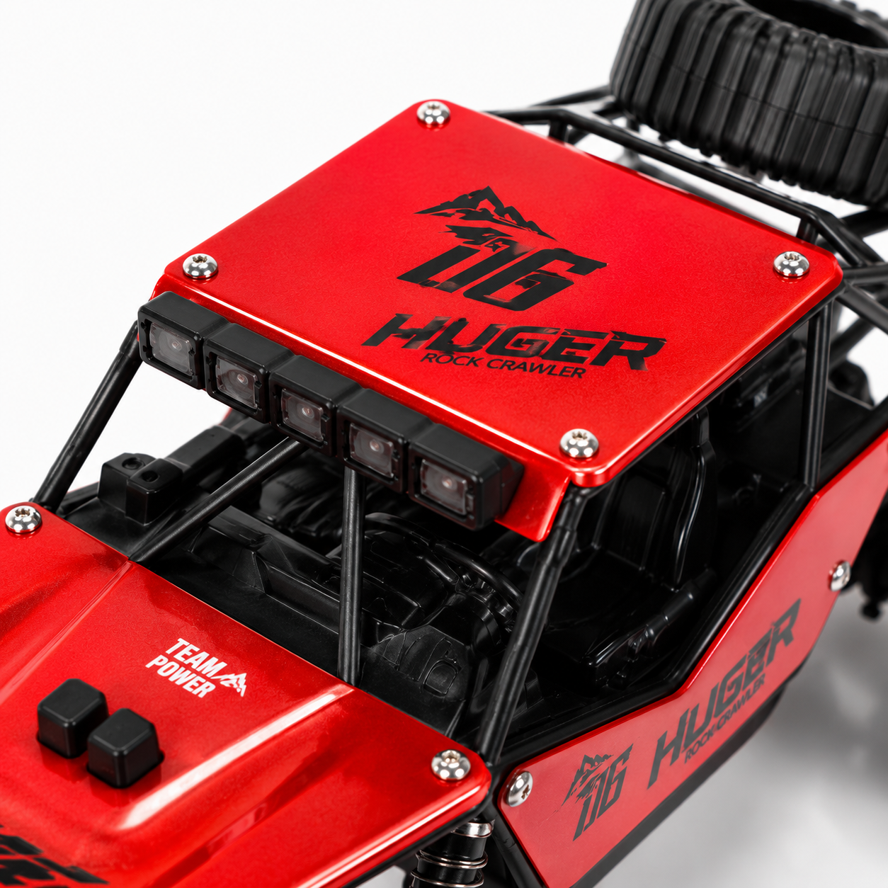Close-up of the RC rock crawler roof, LED light bar and metal body panels.