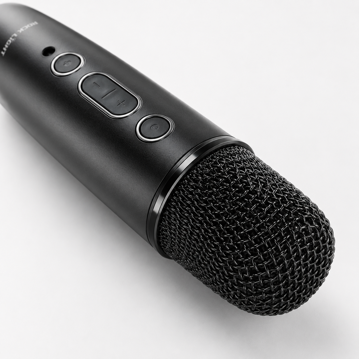 Close-up of the Rock Light wireless karaoke microphone featuring built-in control buttons, durable metal mesh grille, and premium matte black finish for clear voice performance.