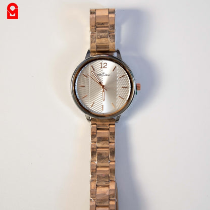 Rose gold women’s bracelet watch with textured dial displayed on white background.