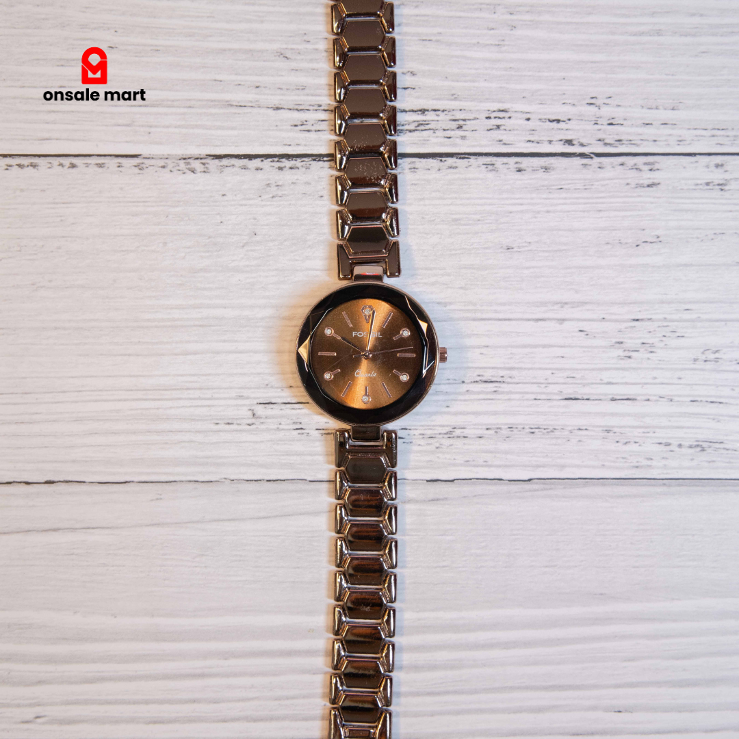 Round dial brown metal bracelet watch with elegant analog display