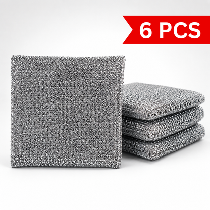 Stack of reusable silver wire kitchen cleaning cloths featuring a durable metal mesh design for scrubbing cookware, dishes, sinks and other kitchen surfaces.