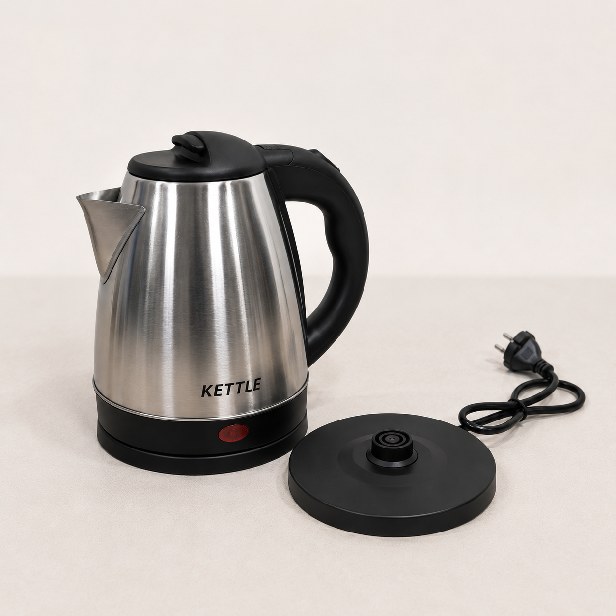 Stainless Steel Electric Kettle with cordless swivel base and indicator light, premium brushed metal finish, isolated on clean white background.