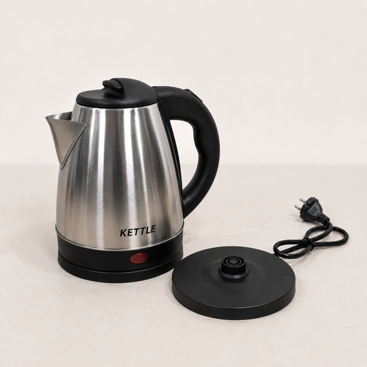 Stainless Steel Electric Kettle with cordless swivel base and indicator light, premium brushed metal finish, isolated on clean white background.
