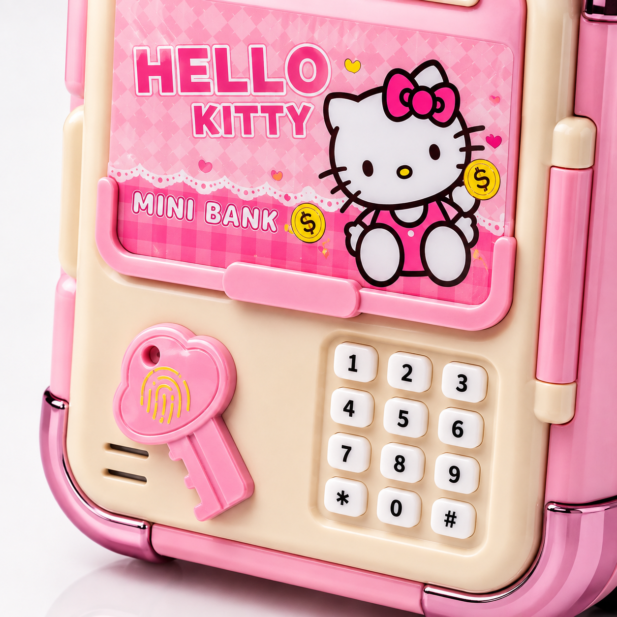 Close-up of a pink electronic money bank for kids featuring a cute cat-themed front panel, 4-digit password keypad, fingerprint-style touch sensor, automatic note deposit slot, and durable suitcase-style design.