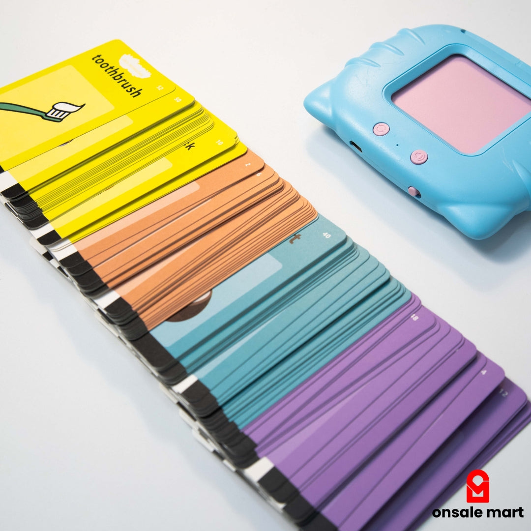 Close-up shot showing the light blue card reader device next to a large, fanned stack of colorful flashcards, emphasizing the quantity of learning material.