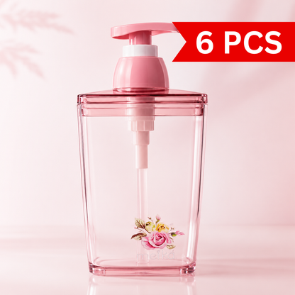 420ml transparent pink square liquid soap dispenser with refillable manual pump, crystal-clear plastic body and elegant floral rose print for modern bathroom and kitchen countertops.
