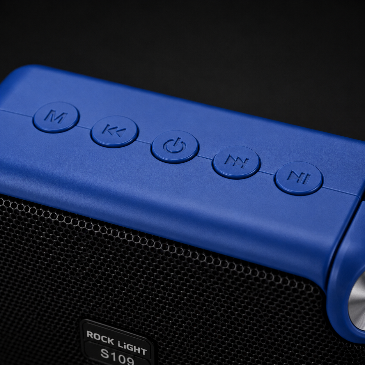 Close-up of Rock Light S109 portable Bluetooth speaker showing top-mounted control buttons for mode selection, playback, volume adjustment, and power control