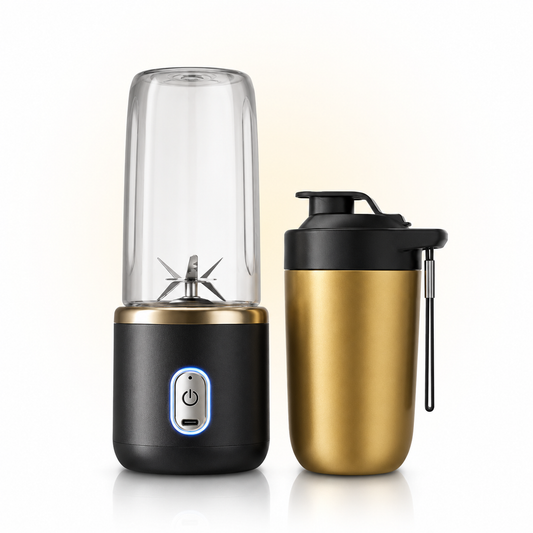 Rechargeable portable juicer blender with transparent blending cup and separate travel cup, featuring a compact cordless design, stainless steel blades, USB charging, and premium black and gold finish.