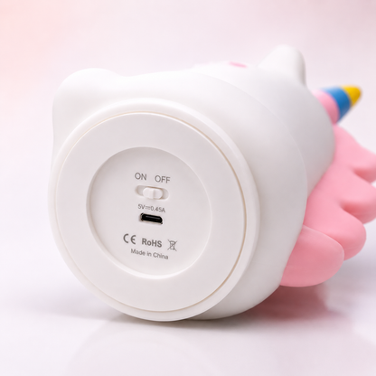 Close-up view of unicorn silicone night lamp bottom with ON/OFF switch and USB charging port