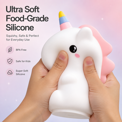 Ultra soft silicone unicorn night light being squeezed to show flexible and soft-touch material