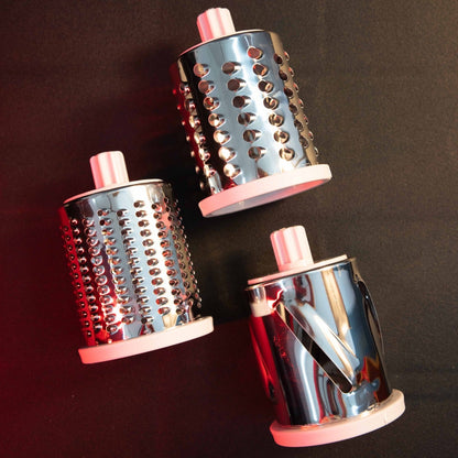 Stainless steel interchangeable drum blades for Manual Vegetable Slicer & Shredder close-up image showing slicer and grater attachments