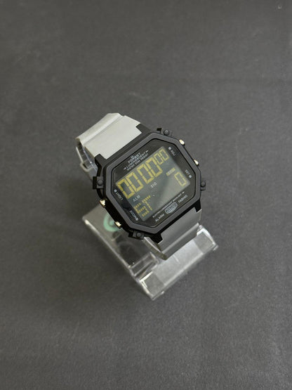 Replica digital wristwatch in grey colour featuring large LED display, alarm, stopwatch and vintage-inspired octagonal case design