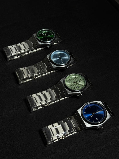 Luxury replica watch collection featuring green, blue, ice blue and textured green dial stainless steel watches displayed on black background