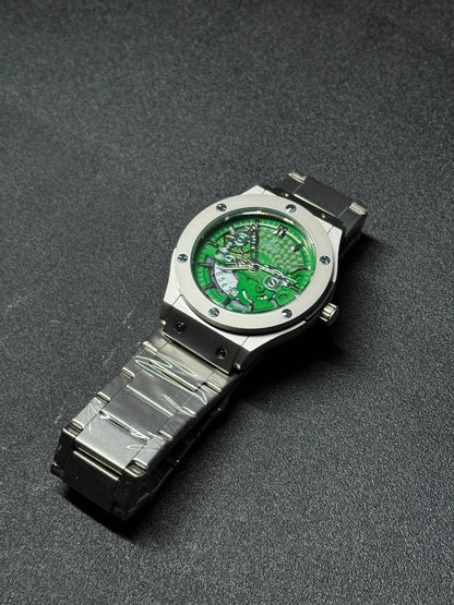 Green skeleton dial replica watch with stainless steel bracelet, luxury sports design and detailed mechanical-style display.