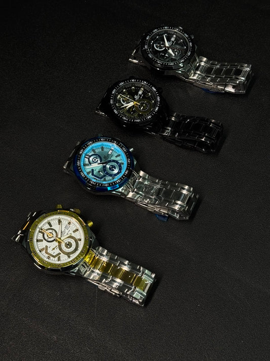 Premium replica chronograph watch collection featuring black, blue, gold-white and green dial variants with stainless steel bracelets on a dark textured background.