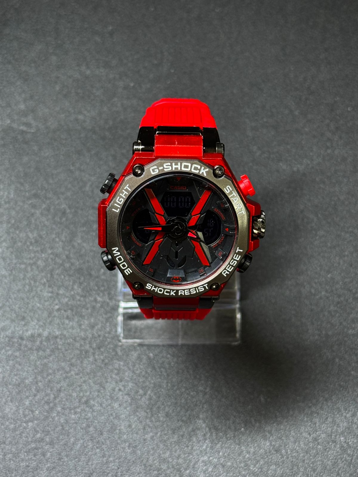 Red and black replica G-Shock style watch featuring analog digital movement, rugged sports design, oversized case and silicone strap