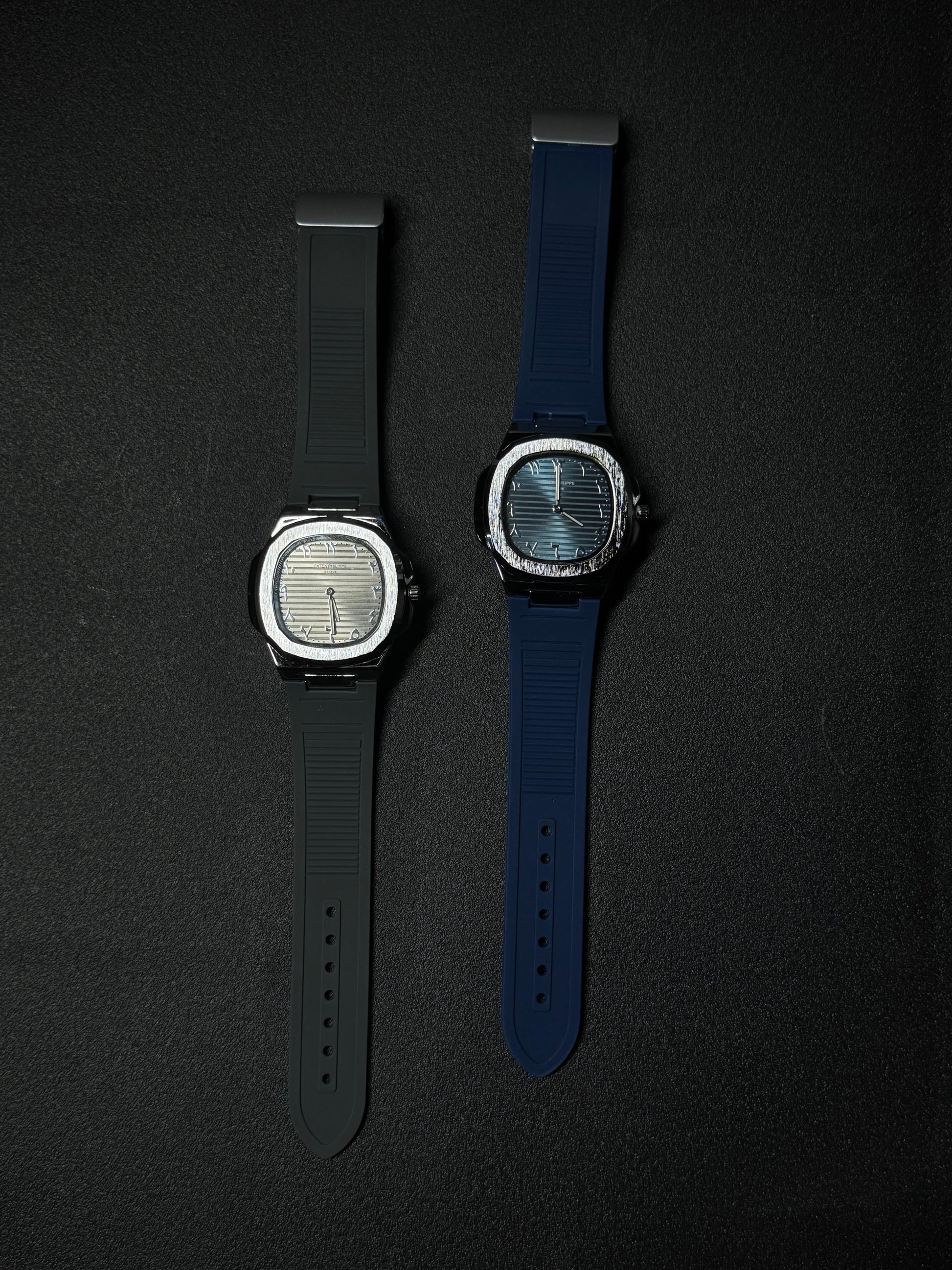 Replica watch collection with black and blue rubber straps, textured dial design and luxury octagonal case styling