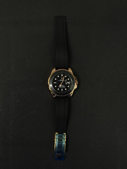 Replica sports watch with black silicone band and premium gold tone case