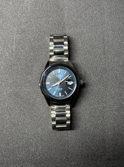 Blue dial replica watch with stainless steel strap, luxury analog men's wristwatch with date display and premium metal bracelet