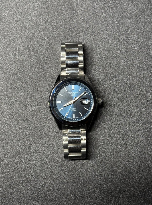 Blue dial replica watch with stainless steel strap, luxury analog men's wristwatch with date display and premium metal bracelet
