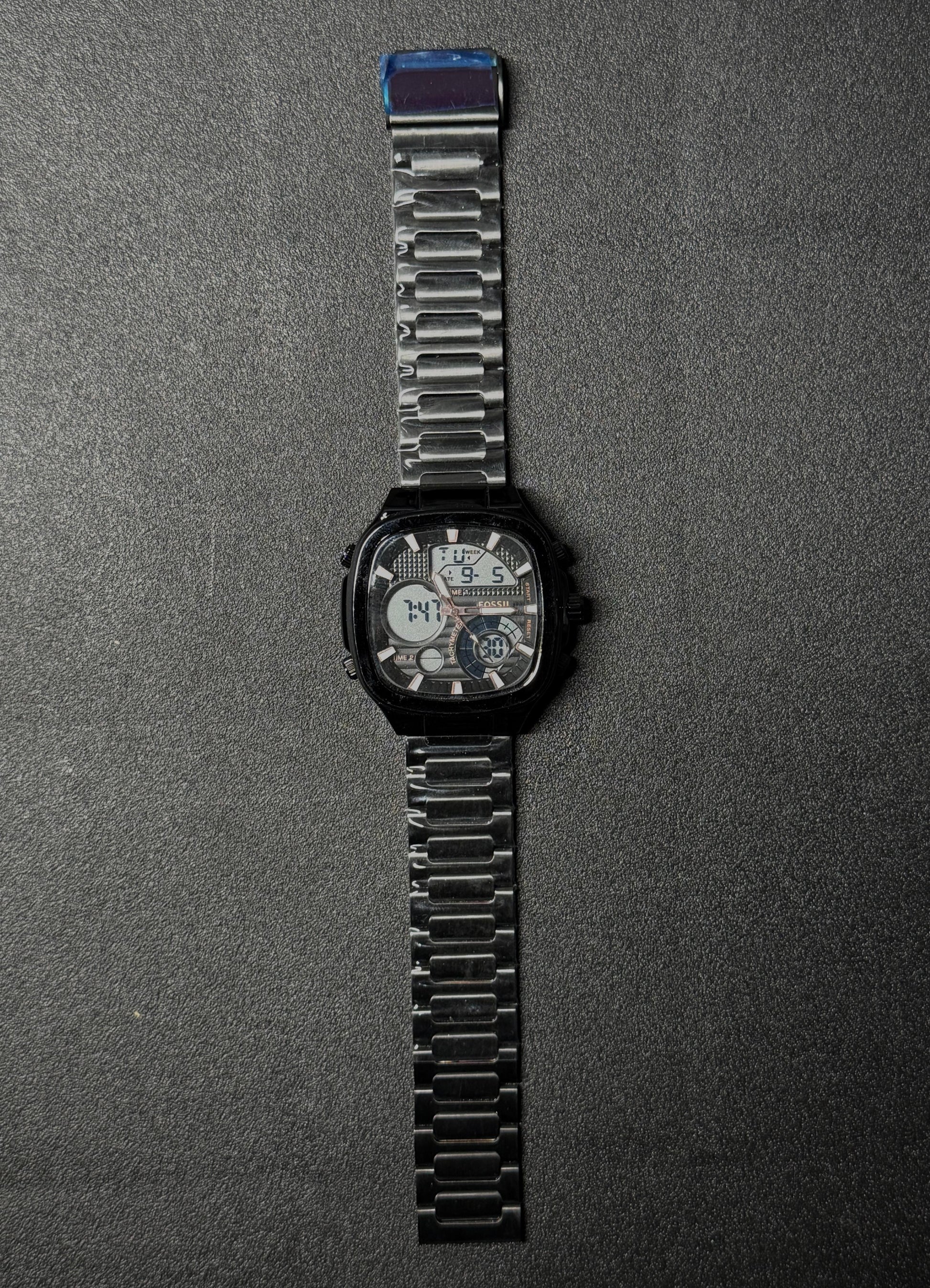 Premium black replica watch featuring analog and digital time display, stainless steel bracelet strap, modern square dial men's wristwatch product photography