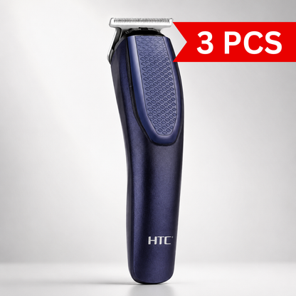 Rechargeable cordless T-blade hair trimmer in metallic navy blue finish with ergonomic textured grip, stainless steel precision blade, professional grooming tool isolated on a light grey studio background.