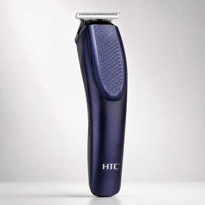 Rechargeable cordless T-blade hair trimmer in metallic navy blue finish with ergonomic textured grip, stainless steel precision blade, professional grooming tool isolated on a light grey studio background.