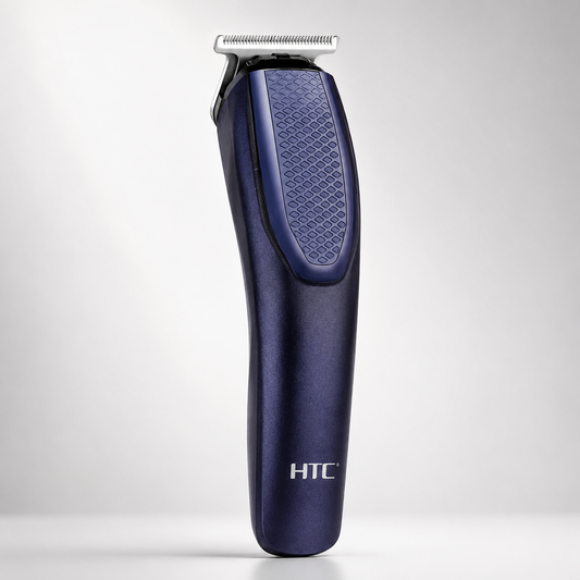 Rechargeable cordless T-blade hair trimmer in metallic navy blue finish with ergonomic textured grip, stainless steel precision blade, professional grooming tool isolated on a light grey studio background.