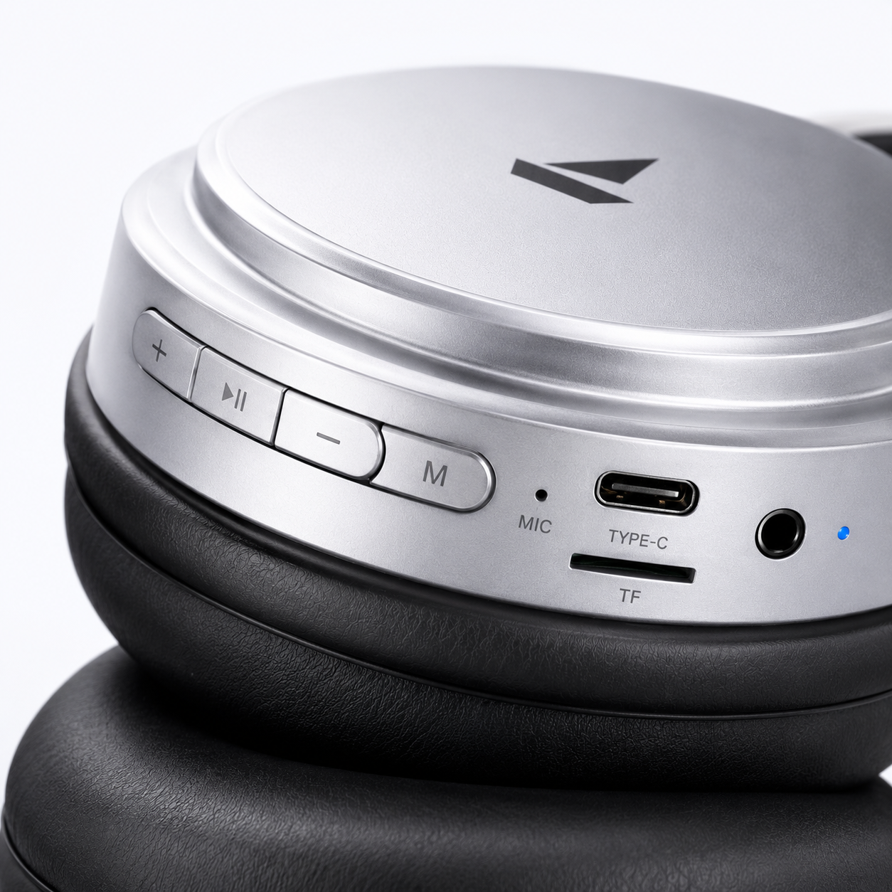 Premium silver over-ear wireless Bluetooth headphones with soft memory foam ear cushions, adjustable headband, built-in microphone, Type-C charging port, TF card slot, AUX input, and multifunction control buttons for immersive Hi-Fi stereo audio.