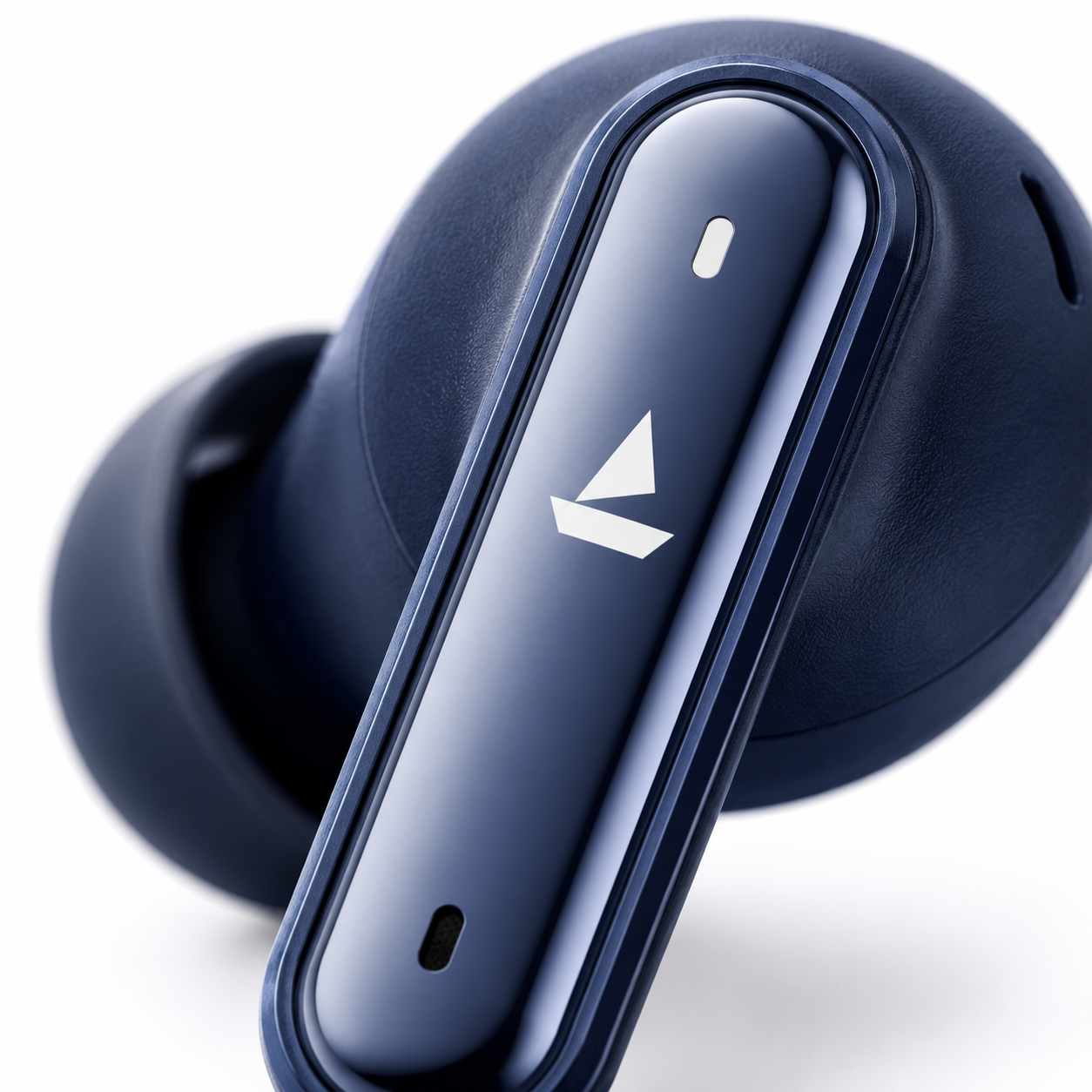 Ultra-close macro view of the boAt Airdopes 111 wireless earbud highlighting the glossy touch control panel, integrated microphone, ergonomic in-ear silicone tip, and premium navy blue finish